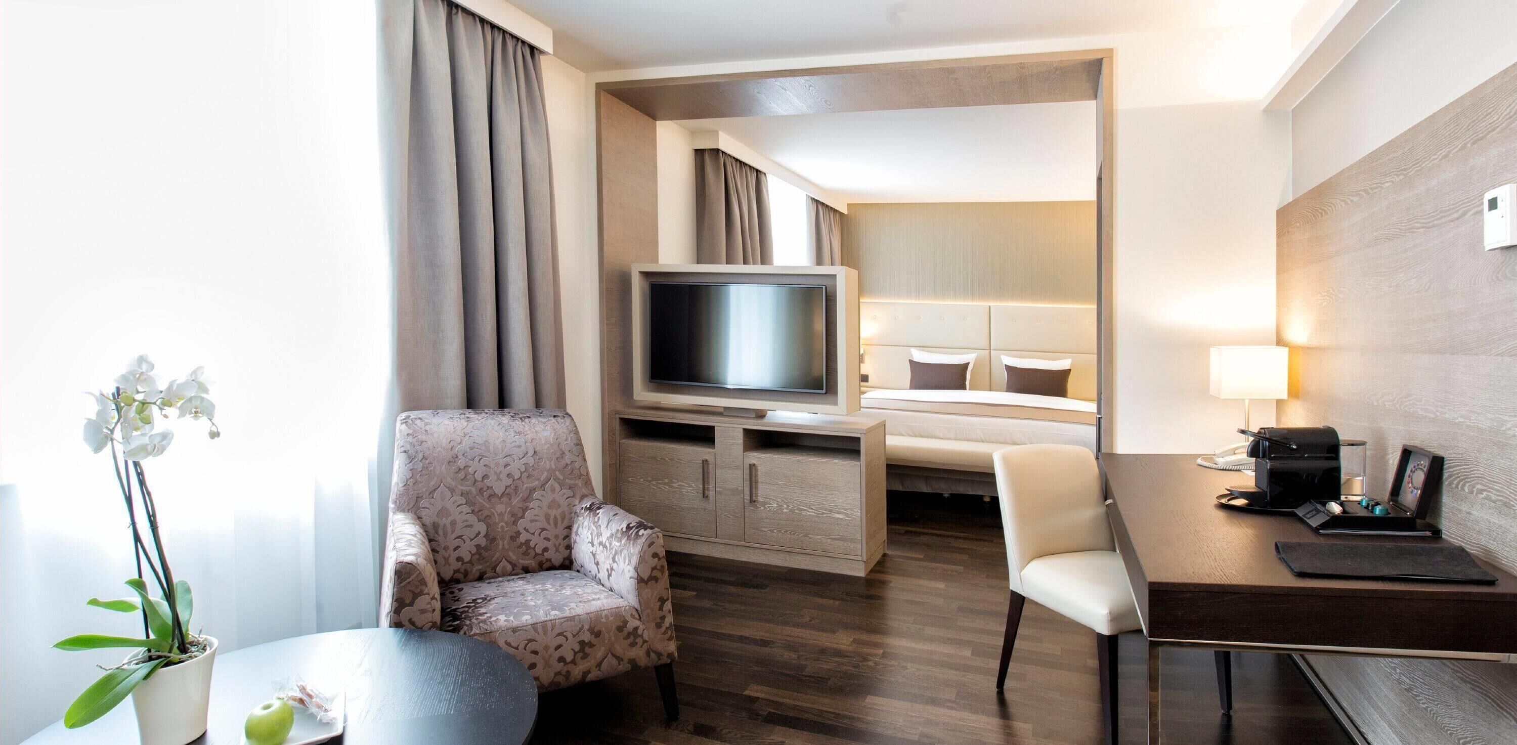 Junior Suite, City View | Hypo-allergenic bedding, in-room safe, individually decorated