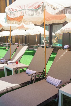 Seasonal outdoor pool, open 11:00 AM to 9:00 PM, pool umbrellas - The Boulder Broker (Boulder)