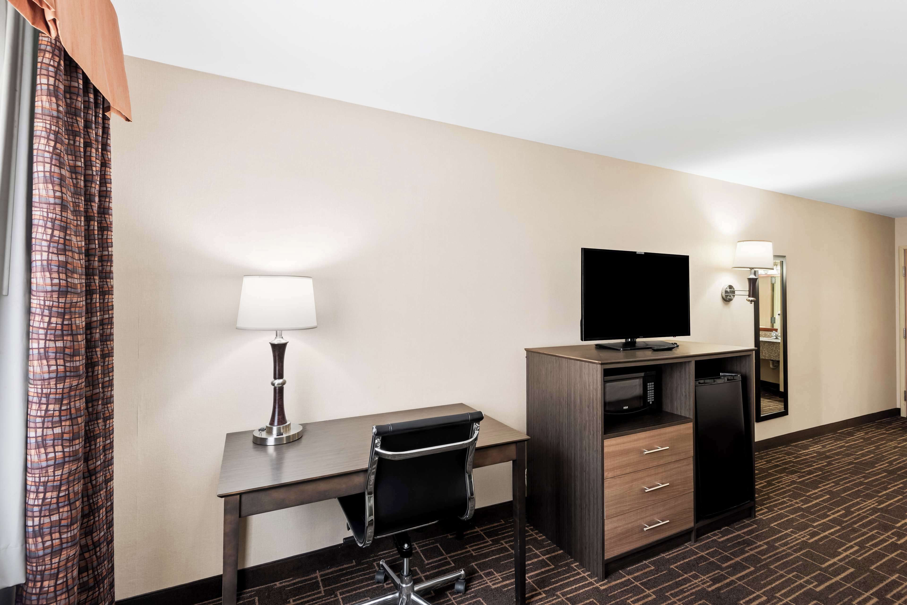 deluxe room, 1 king bed, non smoking, refrigerator & microwave (with sofabed) | premium bedding, iron/ironing board, free wifi, bed sheets