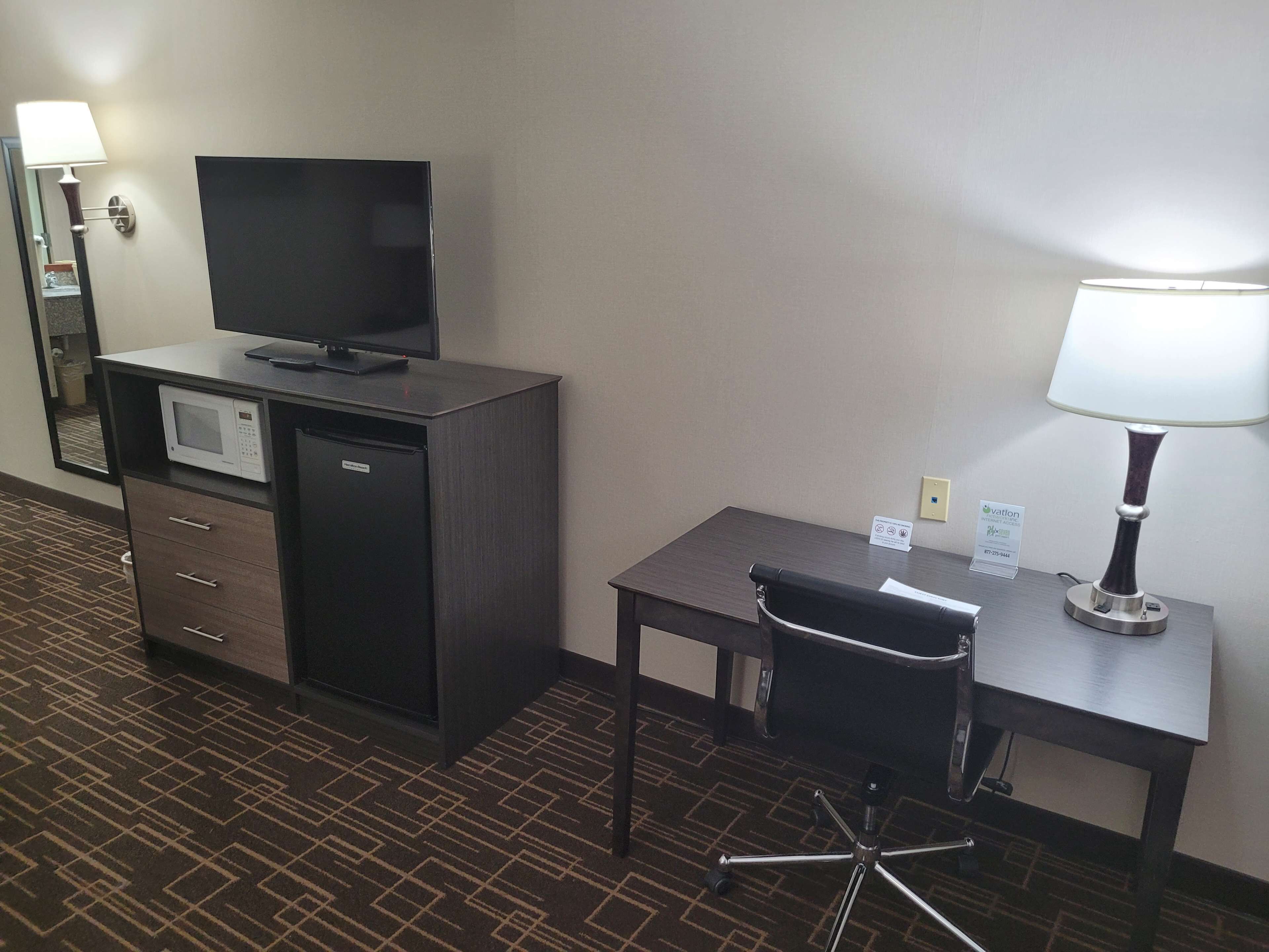 executive suite, 1 king bed, non smoking, refrigerator & microwave | premium bedding, iron/ironing board, free wifi, bed sheets