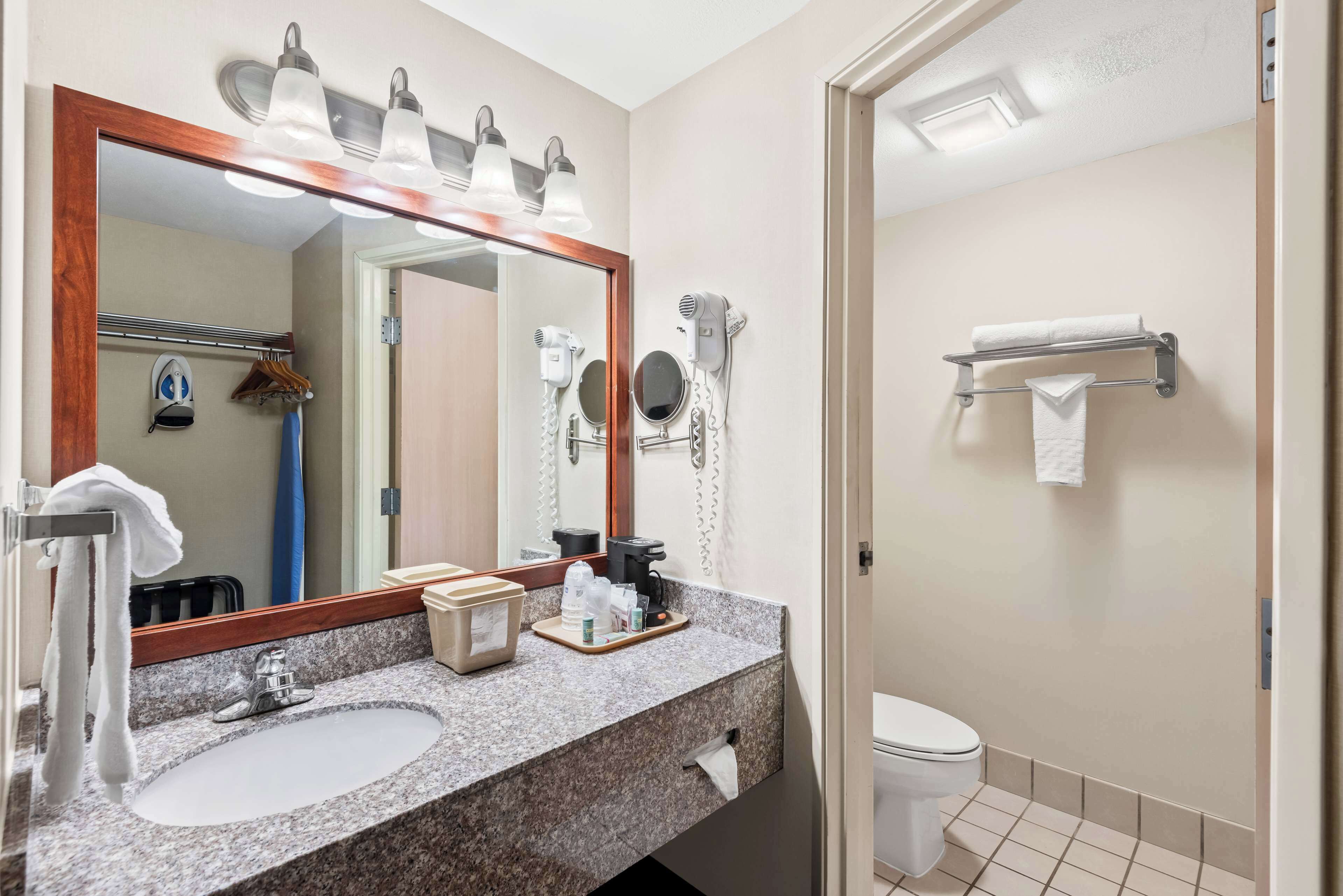 bathtub, free toiletries, hair dryer, towels