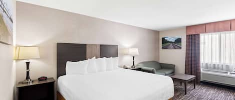 Deluxe Room, 1 King Bed, Non Smoking, Refrigerator & Microwave (with Sofabed) | Premium bedding, iron/ironing board, WiFi (free), bed sheets