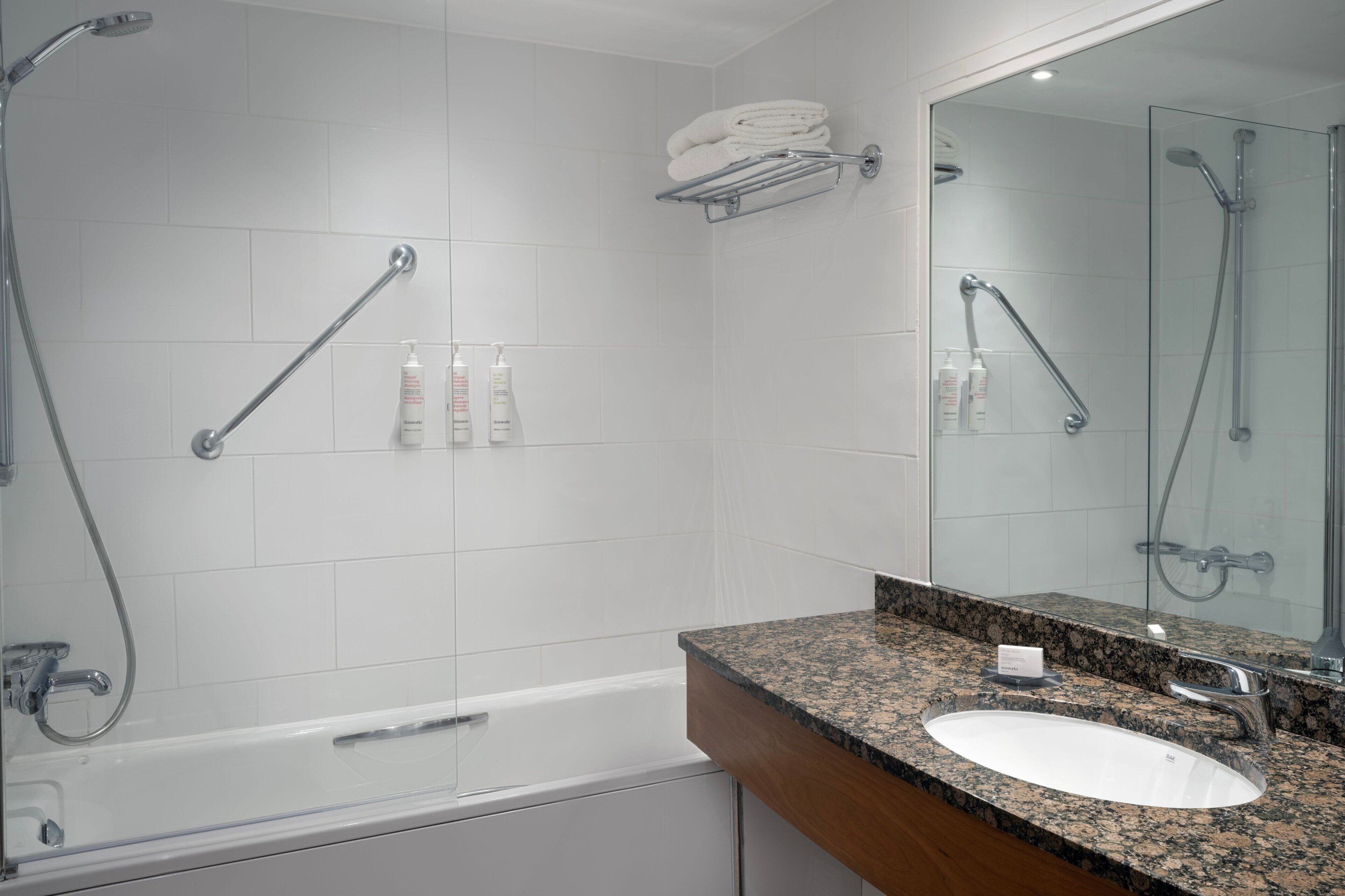 suite, 1 bedroom, non smoking | bathroom | combined shower/bathtub, deep-soaking bathtub, free toiletries