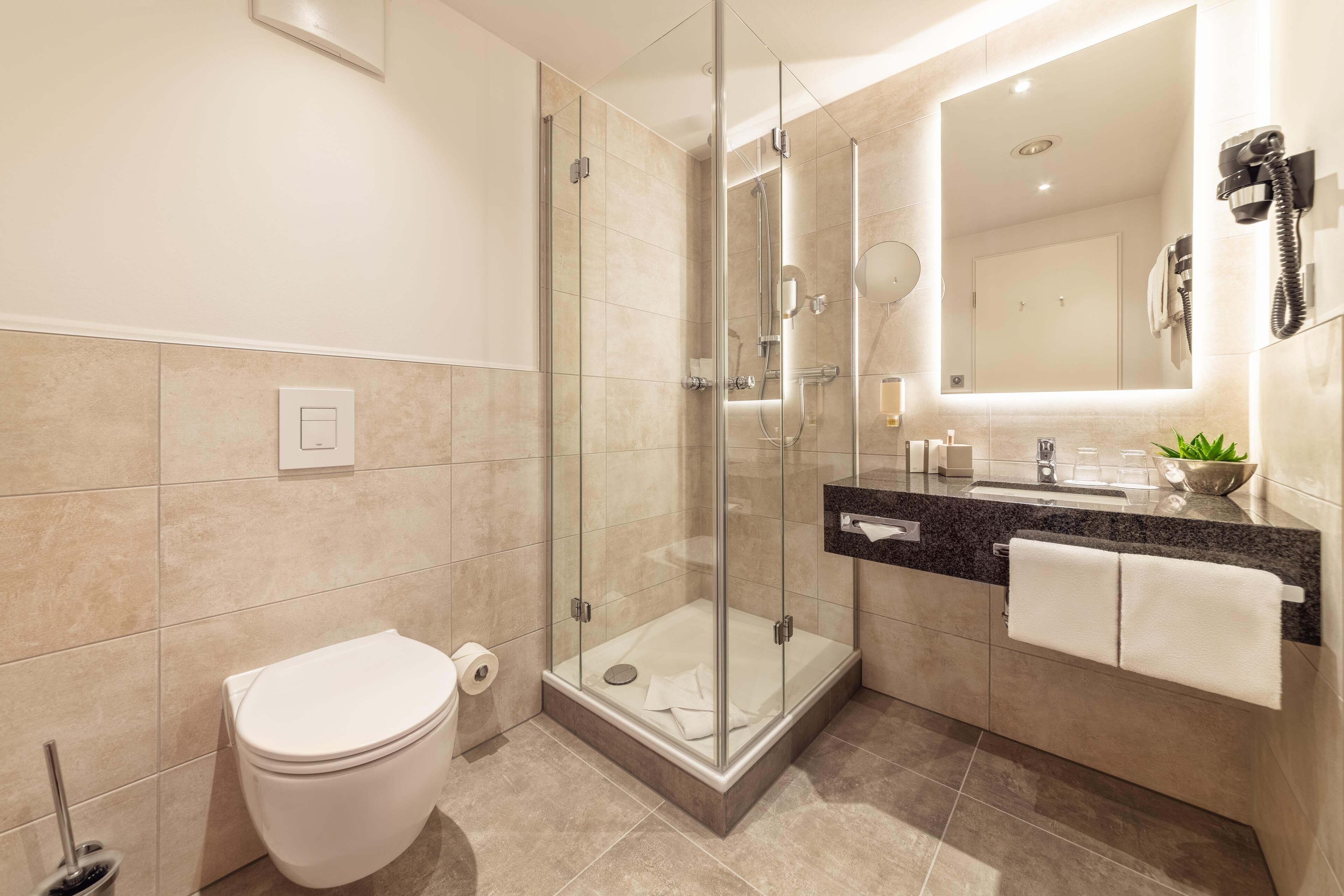 junior suite, patio | bathroom | shower, free toiletries, hair dryer, towels