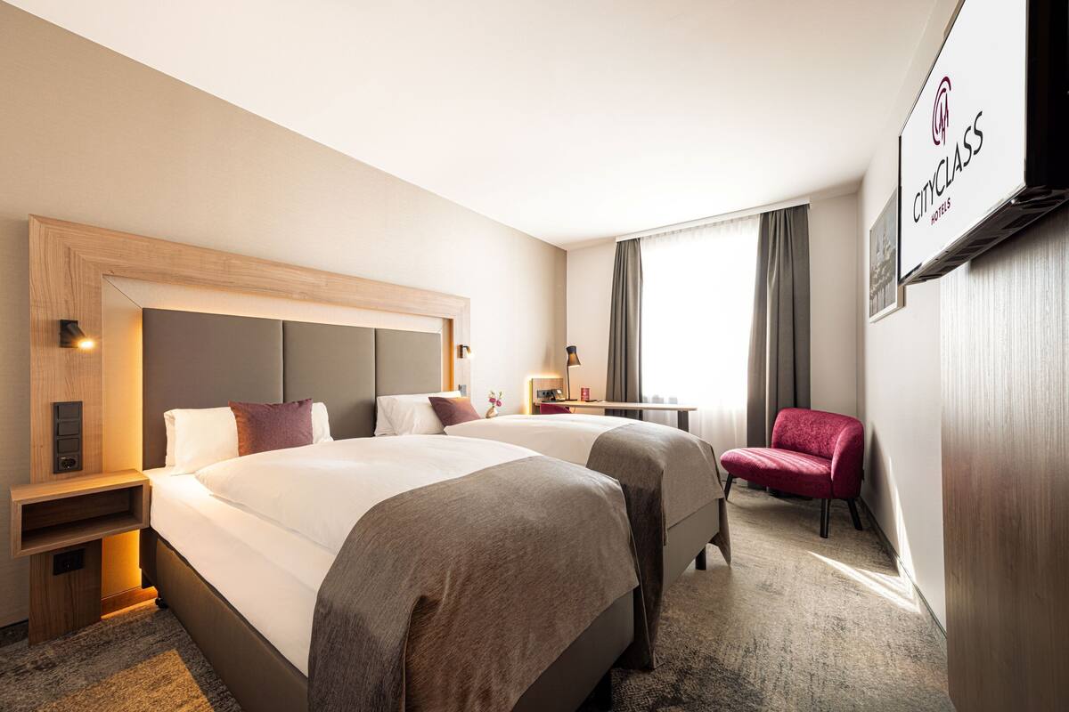 Chambre Confort avec lits jumeaux | Literie hypoallergénique, minibar, coffre-fort, bureau