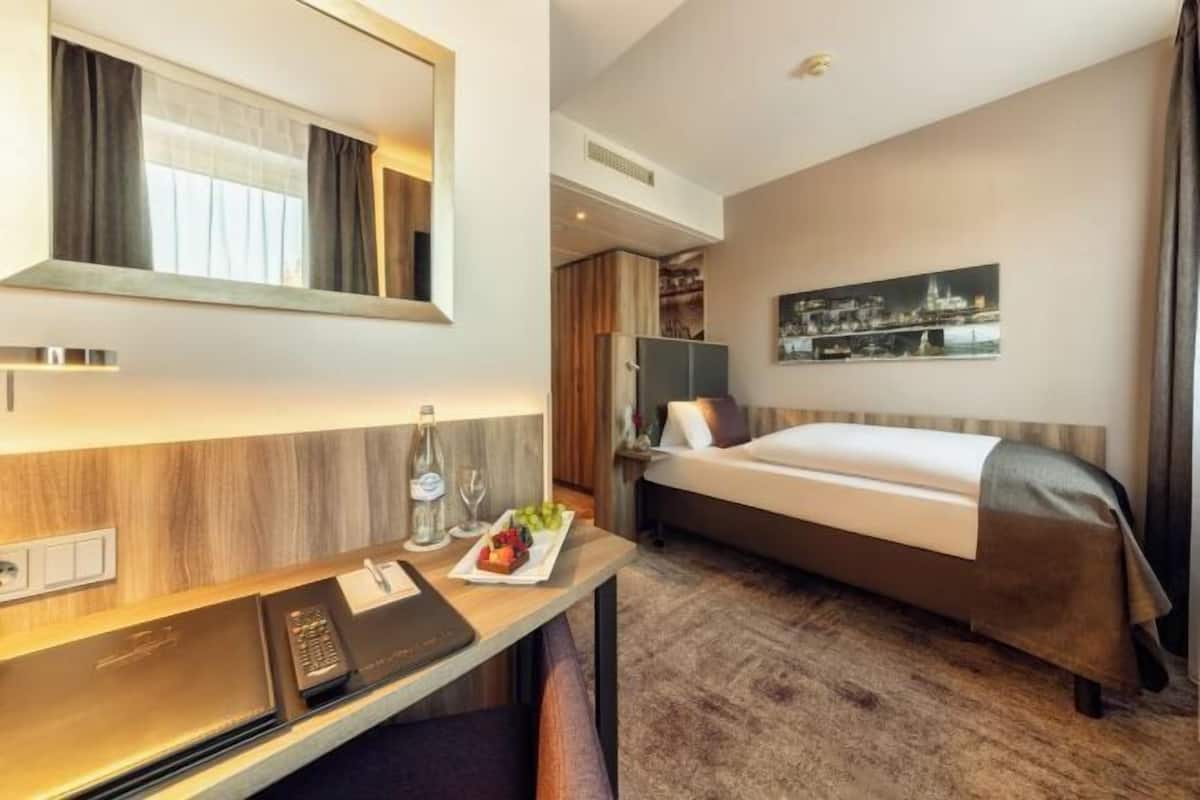 Hypoallergeen beddengoed, een minibar, een kluis op de kamer, een bureau