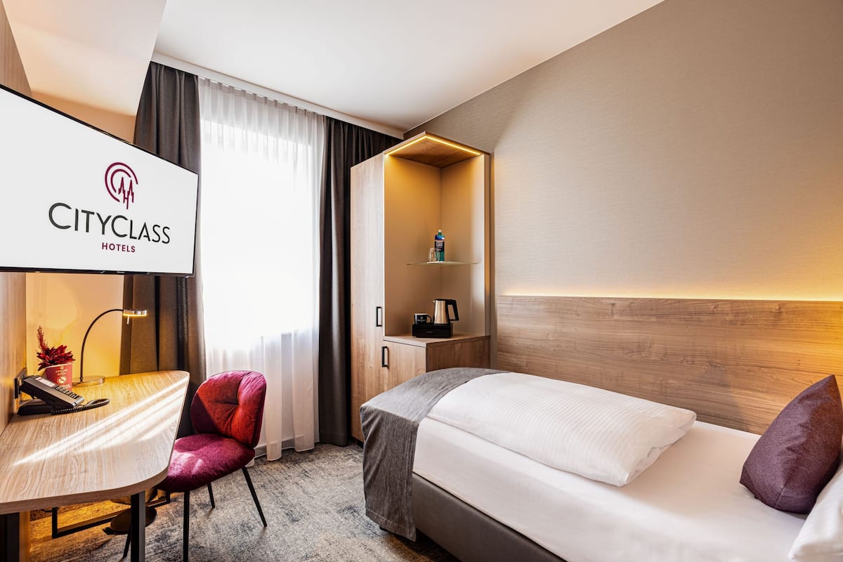 Chambre simple Confort | Literie hypoallergénique, minibar, coffre-fort, bureau