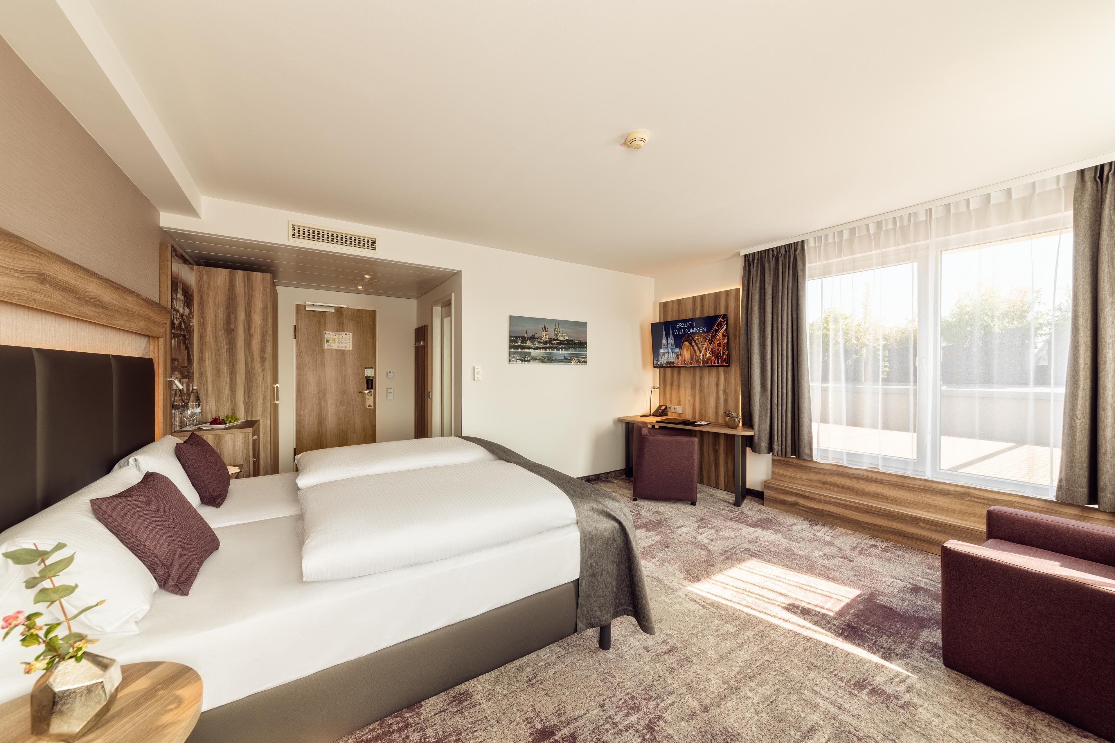 junior suite, patio | 1 bedroom, hypo-allergenic bedding, minibar, in-room safe