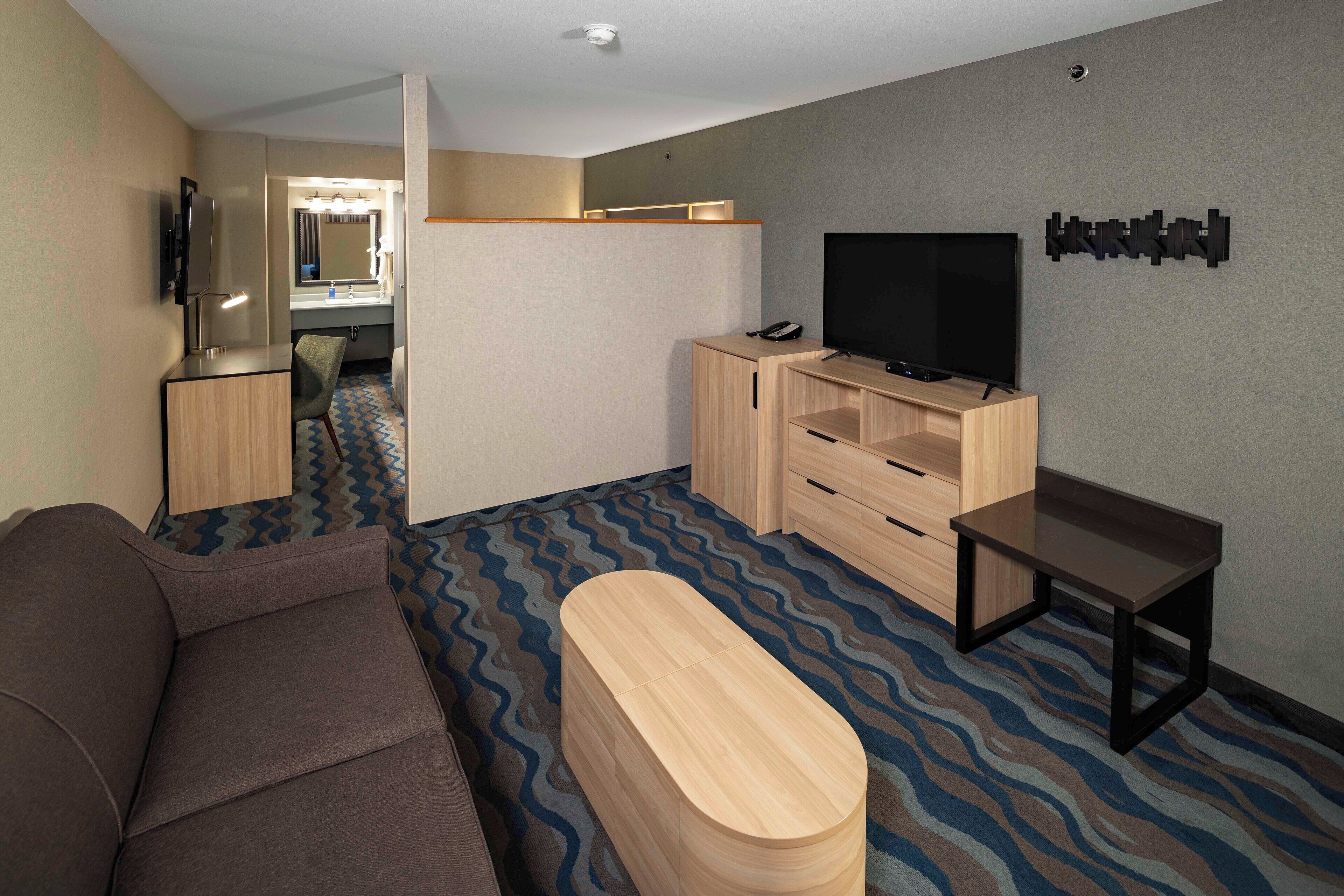 junior suite | 1 bedroom, desk, blackout curtains, iron/ironing board