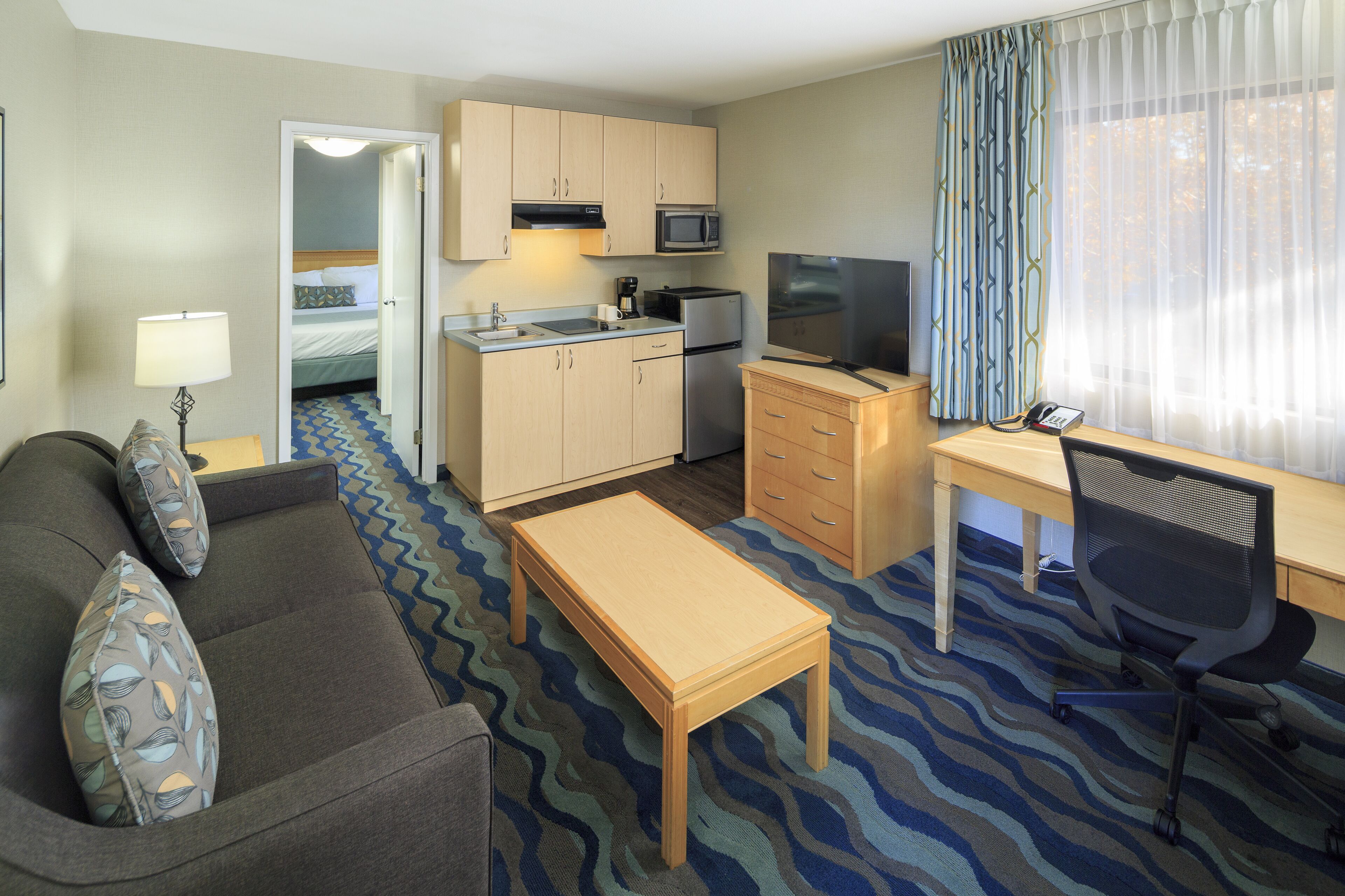 one bedroom suite with kitchenette | 1 bedroom, desk, blackout curtains, iron/ironing board