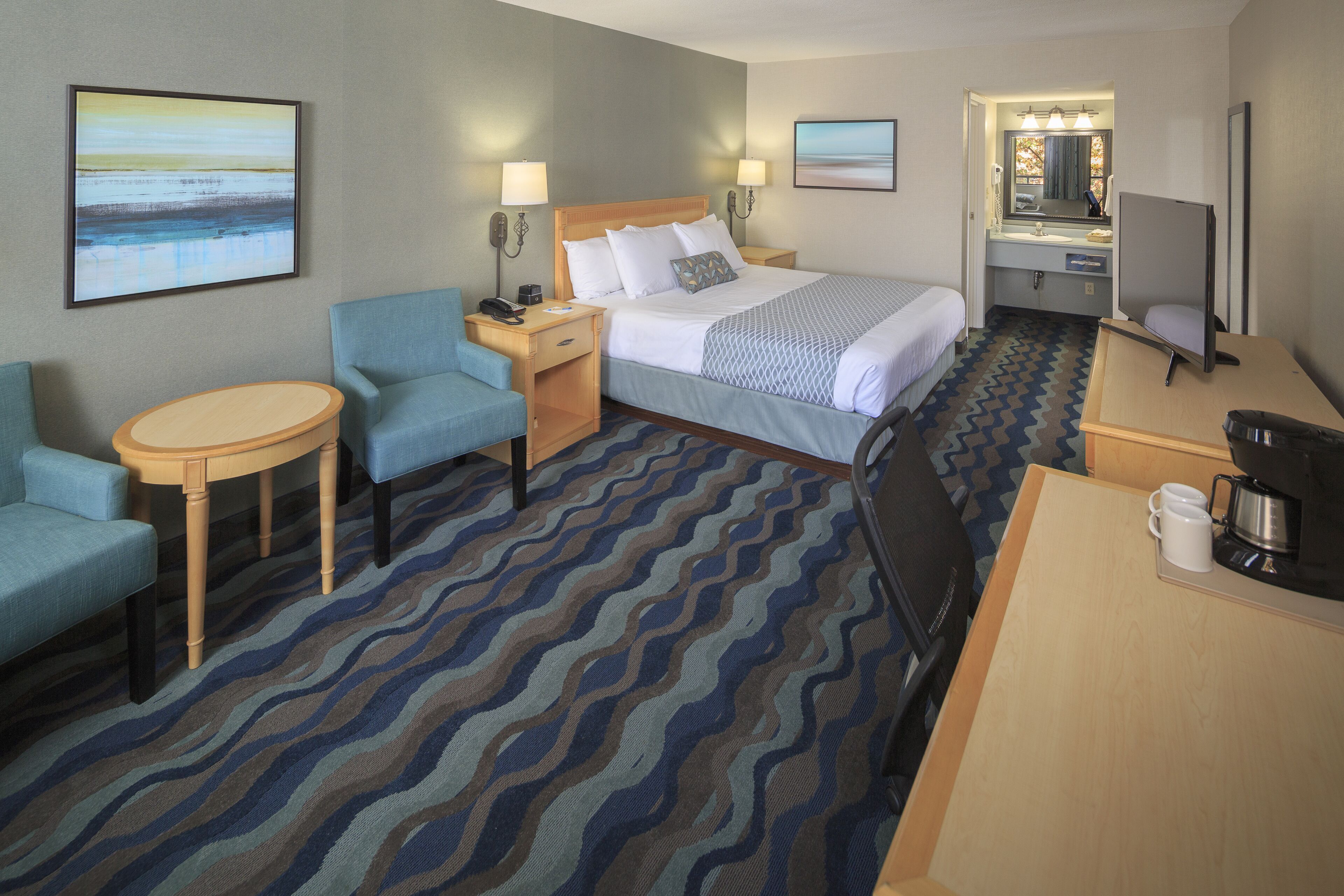 Desk, blackout drapes, iron/ironing board, free cribs/infant beds