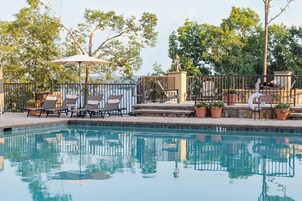 Outdoor pool, pool umbrellas, sun loungers