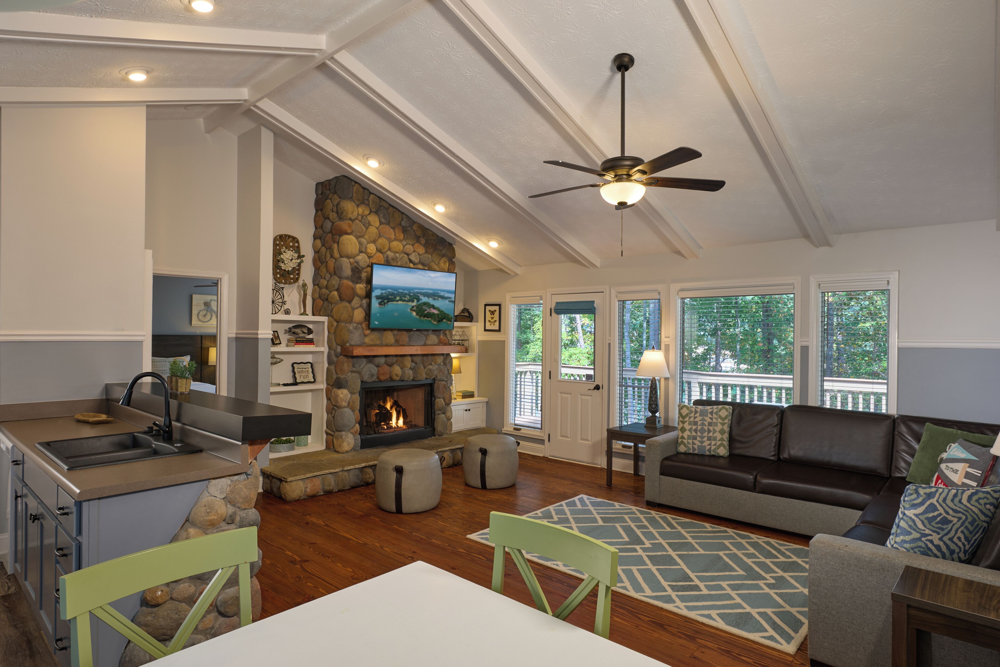 House, 2 Bedrooms (at Lanier Island) | Living area | Flat-screen TV, iPod dock, pay movies