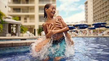 Outdoor pool, open 8:00 AM to 9:00 PM, pool cabanas (surcharge)