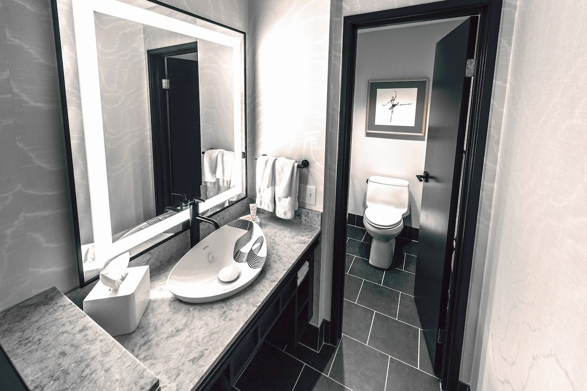 hair dryer, bathrobes, towels, soap