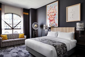 Deluxe King | Premium bedding, down comforters, in-room safe, blackout drapes