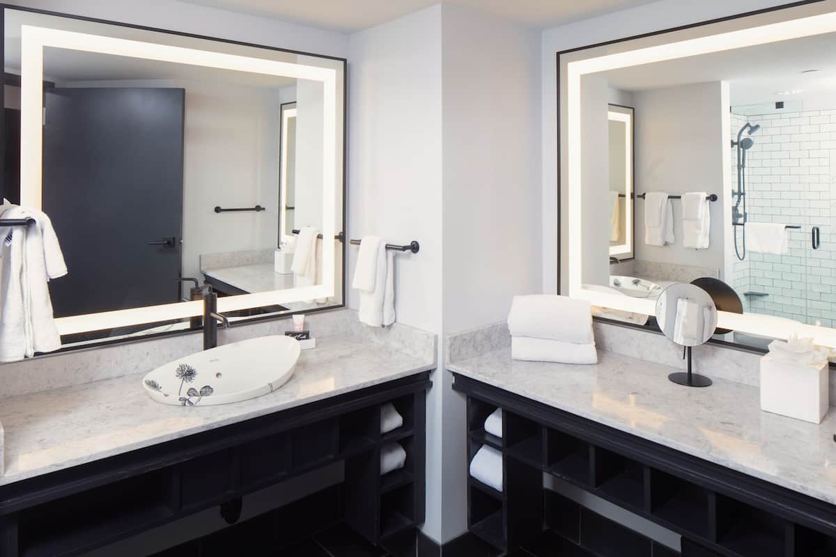 hair dryer, bathrobes, towels, soap