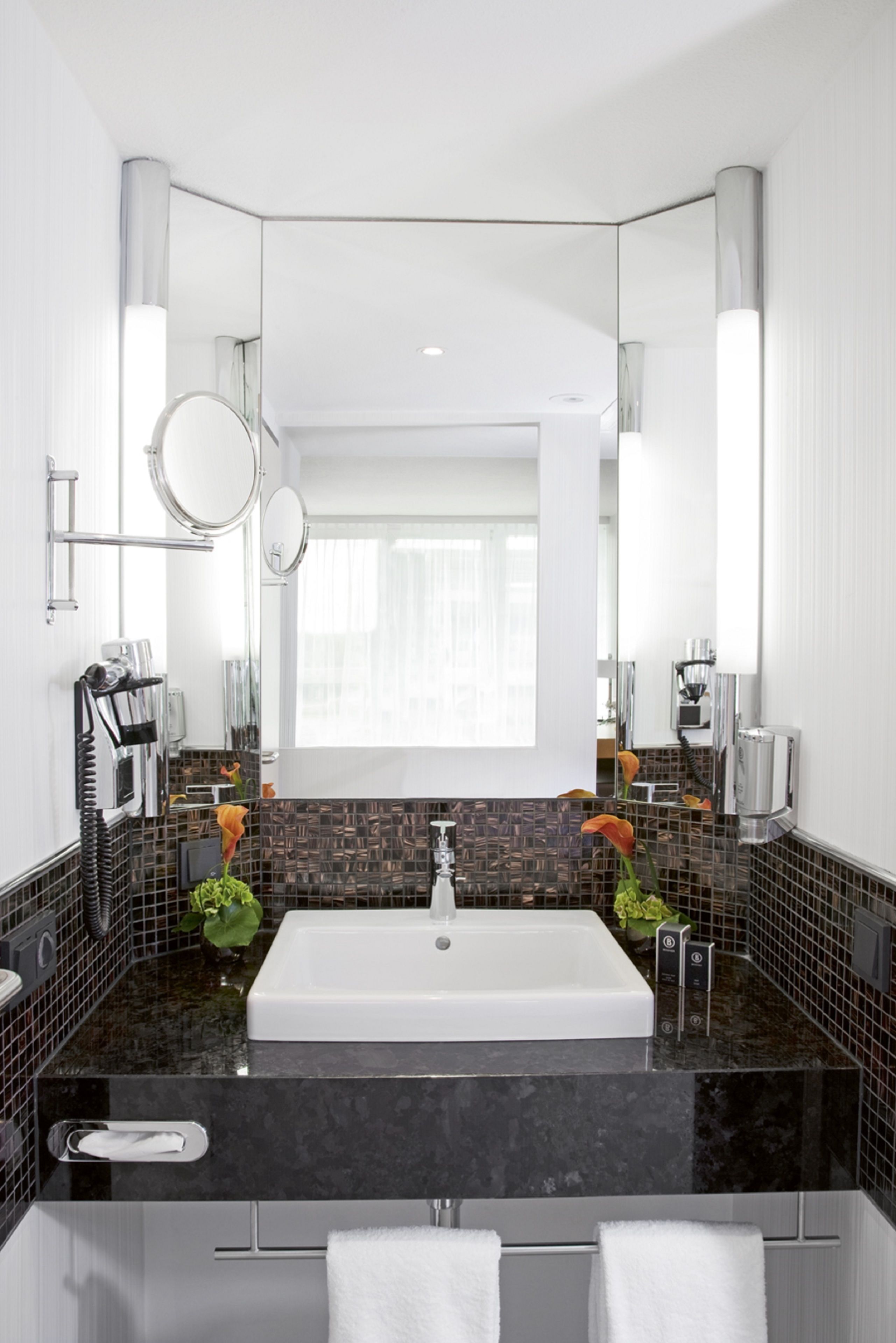 combined shower/bathtub, eco-friendly toiletries, hair dryer, bathrobes