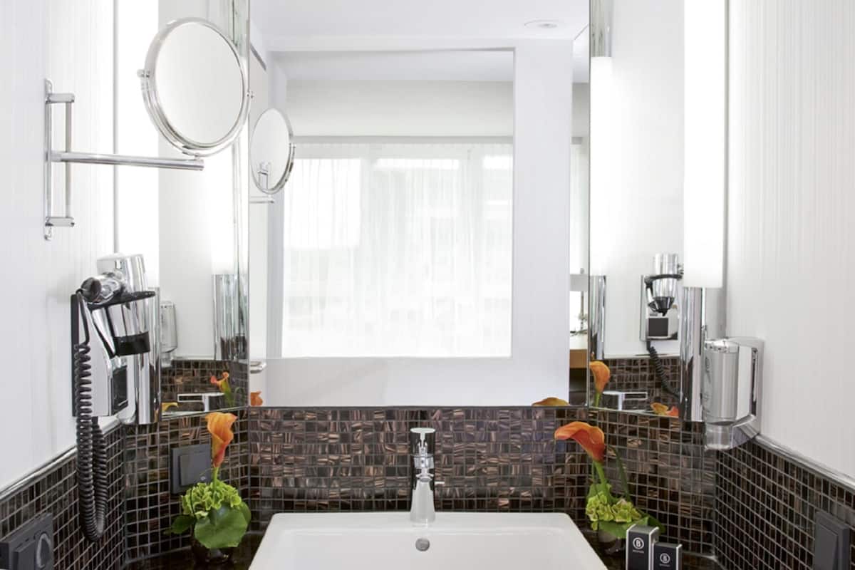 combined shower/bathtub, eco-friendly toiletries, hair dryer, bathrobes
