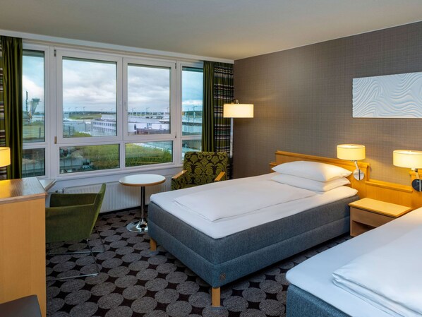Hypo-allergenic bedding, minibar, in-room safe, desk