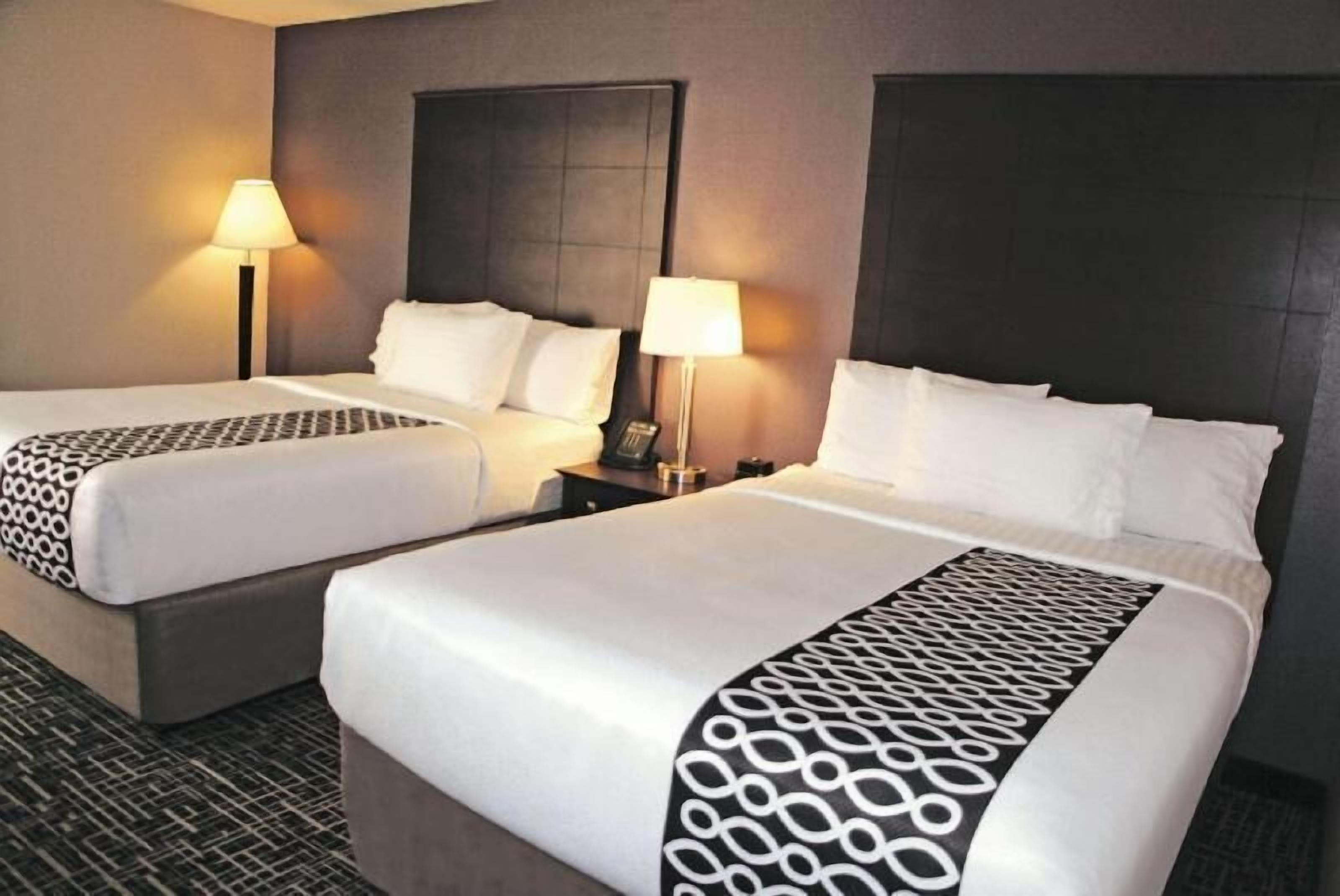 In-room safe, desk, iron/ironing board, free cribs/infant beds