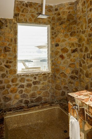 Junior Suite with private pool | Bathroom | Shower, hair dryer, towels