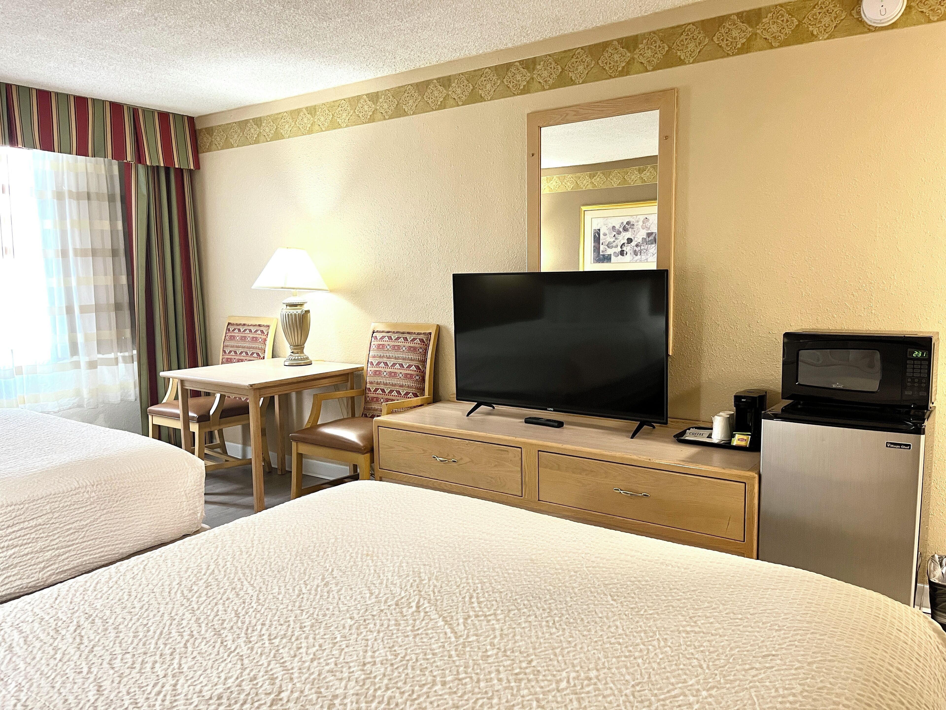 standard room, 2 queen beds, non smoking | desk, blackout curtains, iron/ironing board, free wifi