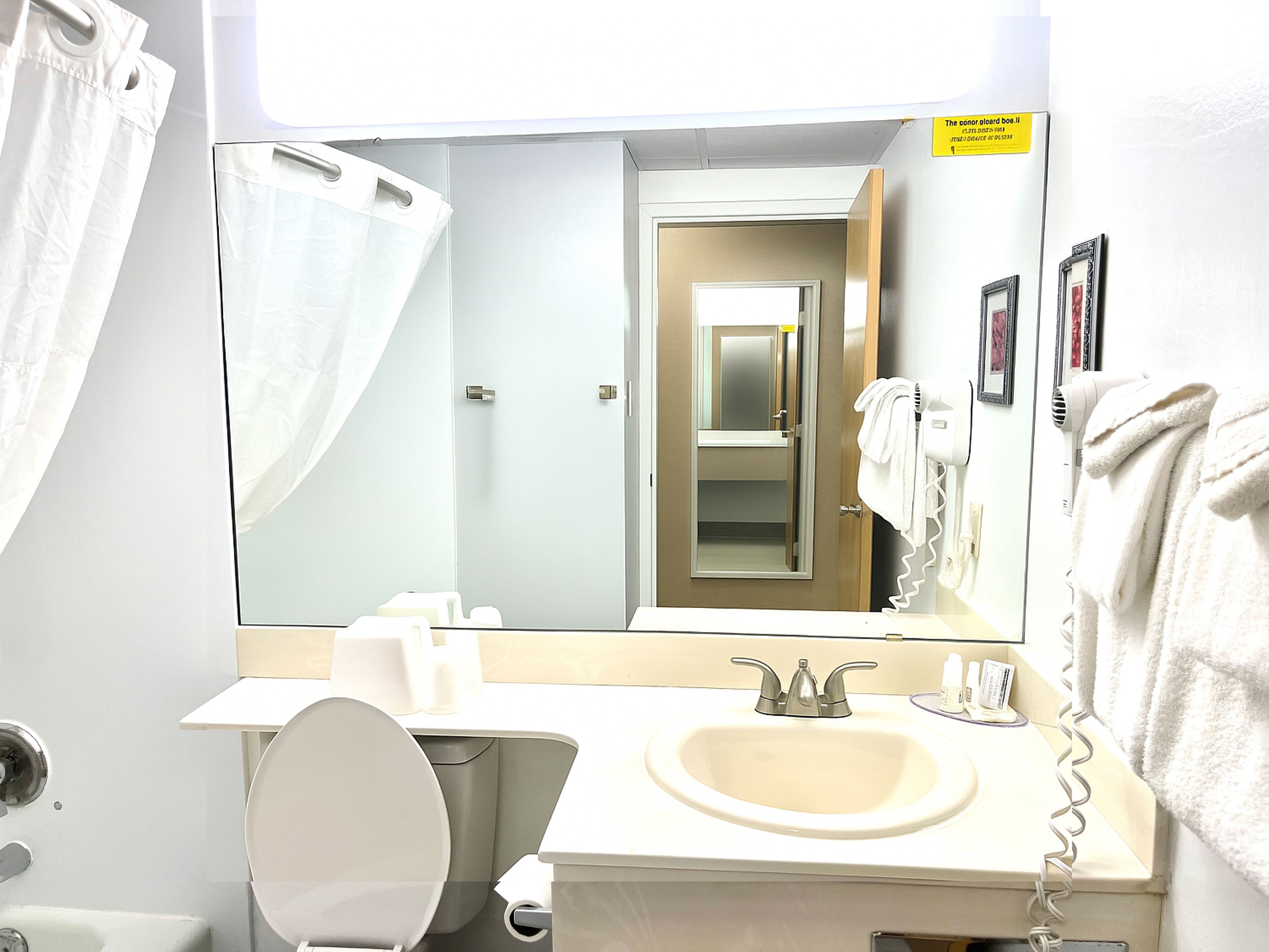 standard room, 2 queen beds, non smoking | bathroom | combined shower/bathtub, free toiletries, hair dryer, towels