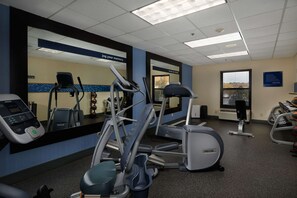Stay fit on the go with our fully equipped fitness center featuring treadmills, elliptical trainers, and a stationary bike.