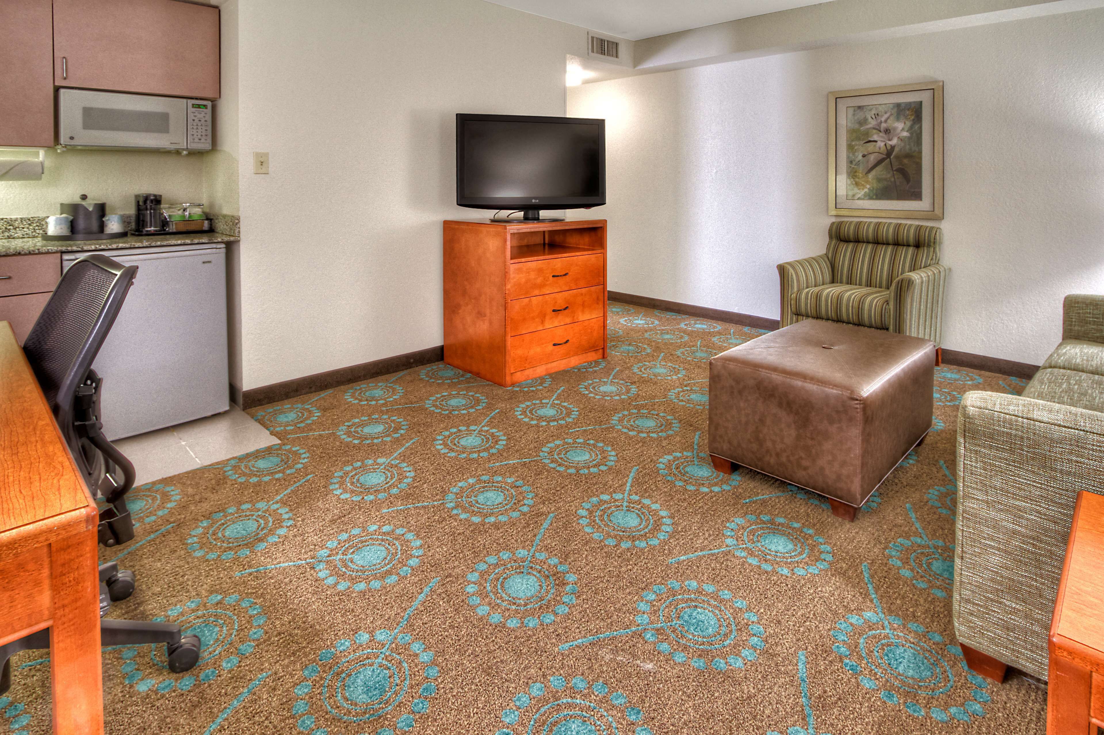 one king suite non smoking | living area | flat-screen tv, pay films