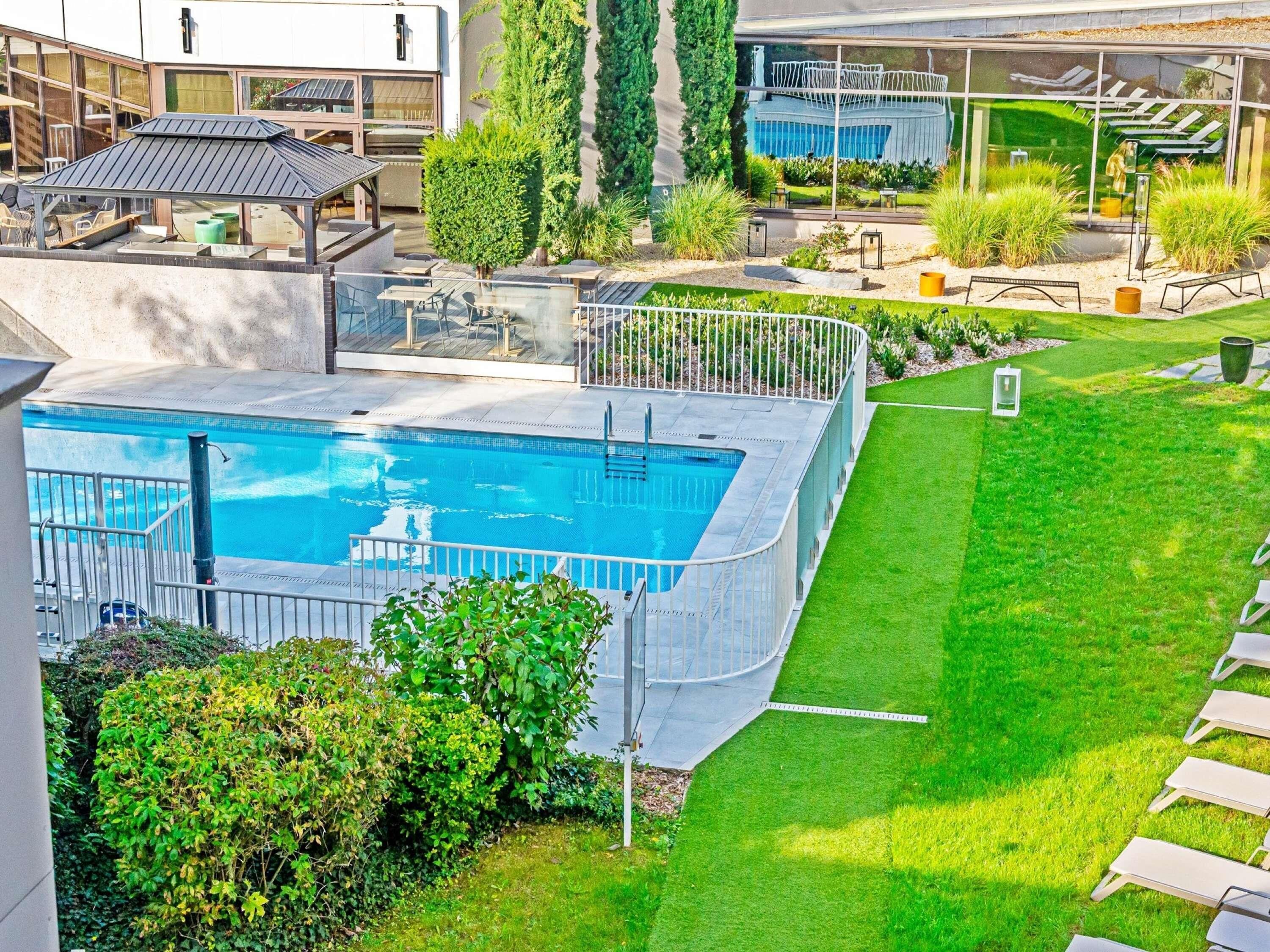 Seasonal outdoor pool, open 10 AM to 9 PM, pool loungers