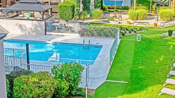 Seasonal outdoor pool, open 10 AM to 9 PM, pool loungers
