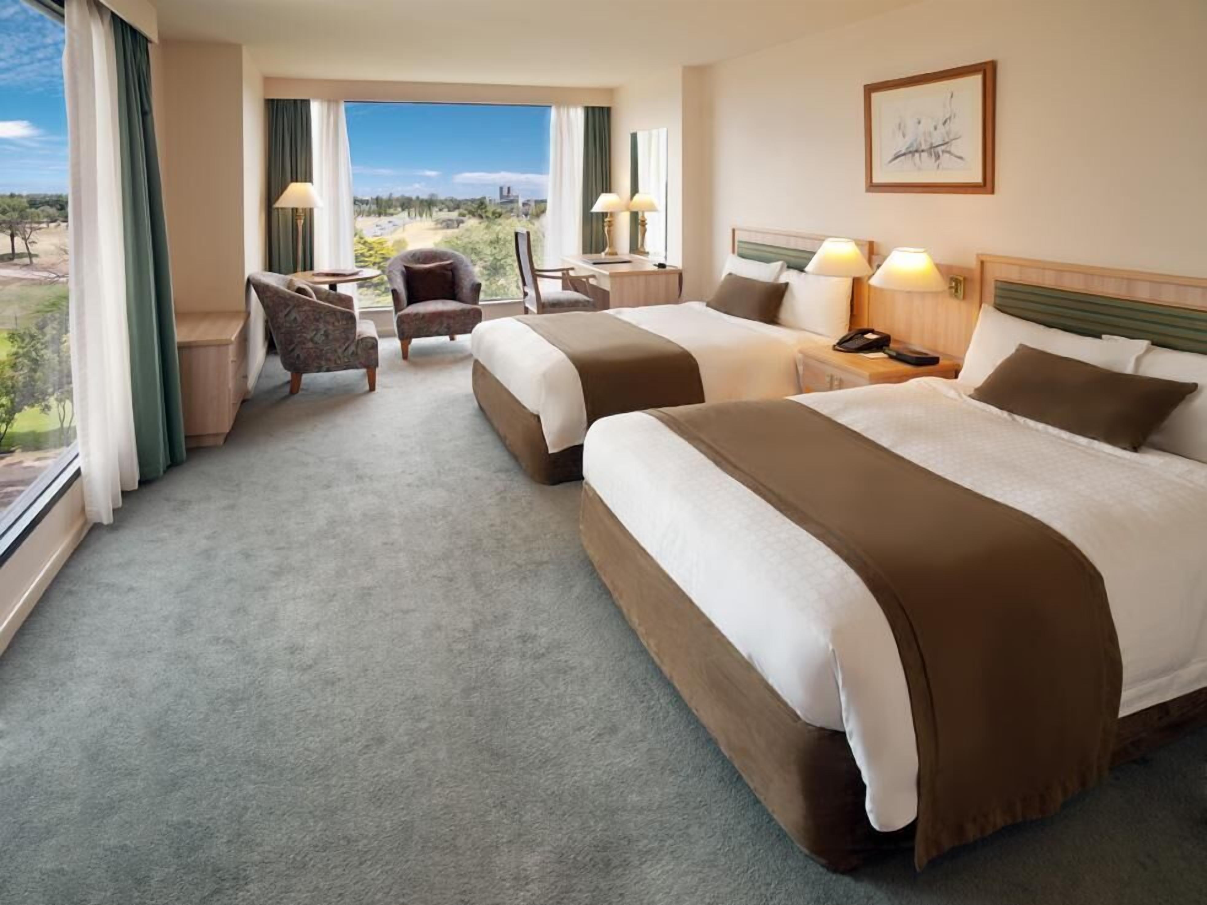 Desk, blackout drapes, iron/ironing board, cribs/infant beds