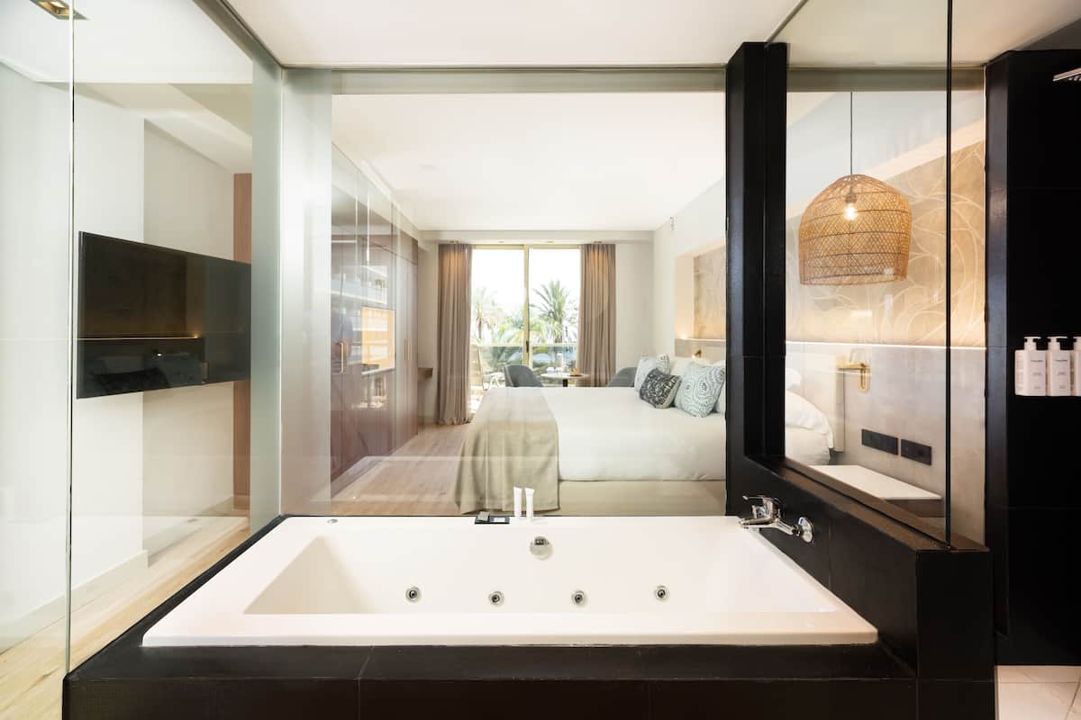 superior room | bathroom | separate bathtub and shower, designer toiletries, hair dryer, bathrobes