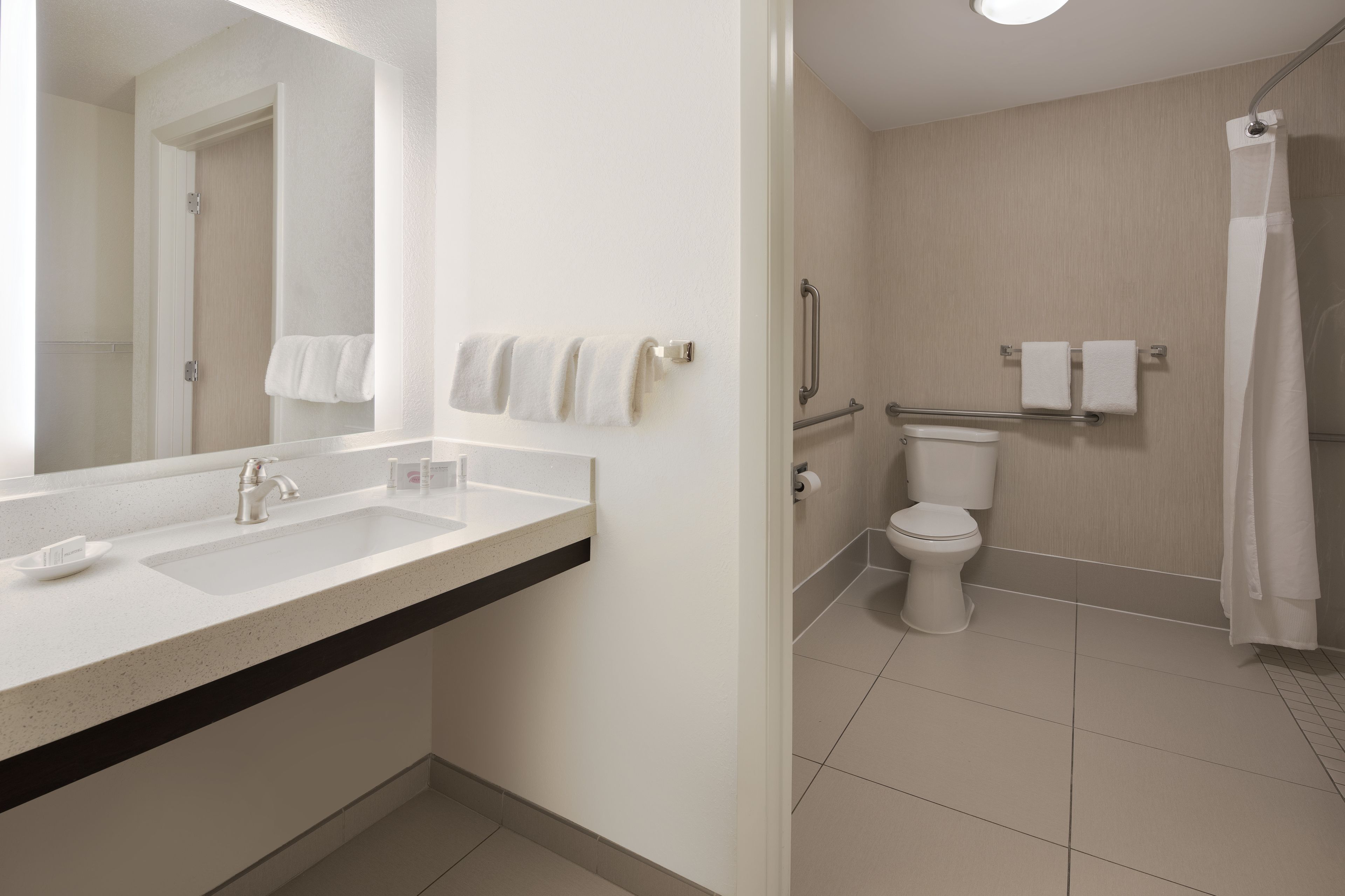 combined shower/bathtub, free toiletries, hair dryer, towels