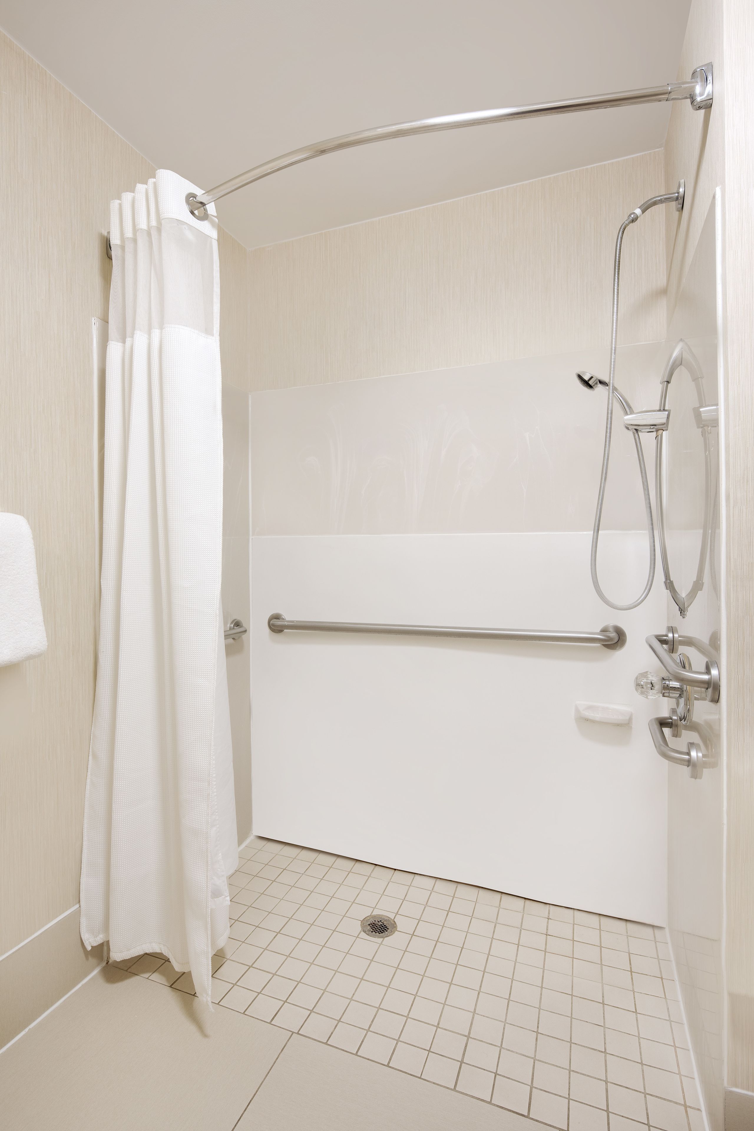 combined shower/bathtub, free toiletries, hair dryer, towels
