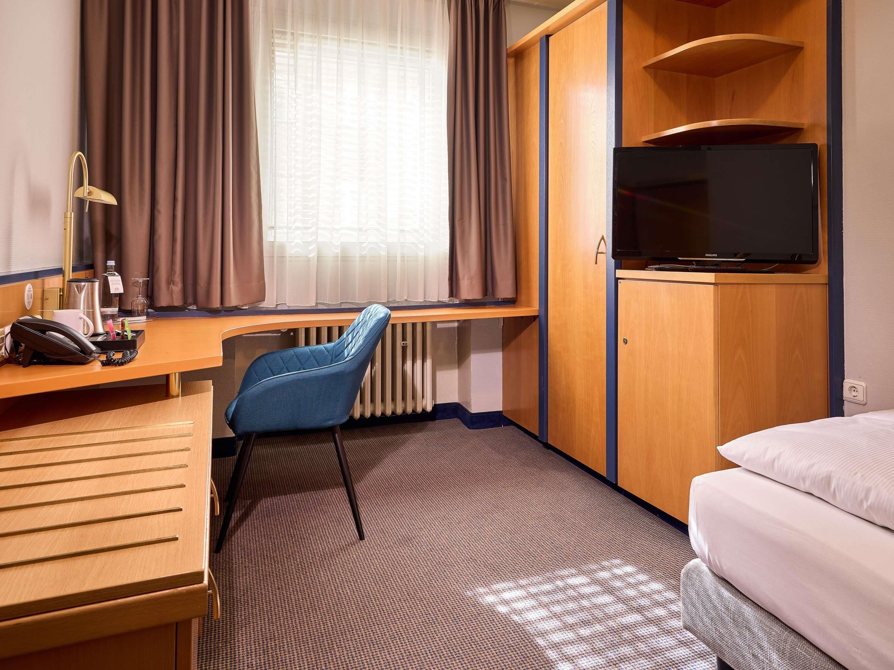 经典客房, 1 张单人床 | 防过敏的被褥、客房内保险箱、办公桌、笔记本电脑工作区