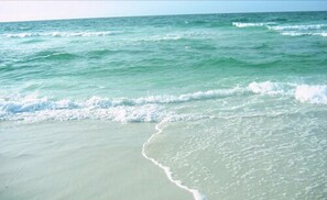 Private beach, white sand, sun loungers, beach umbrellas