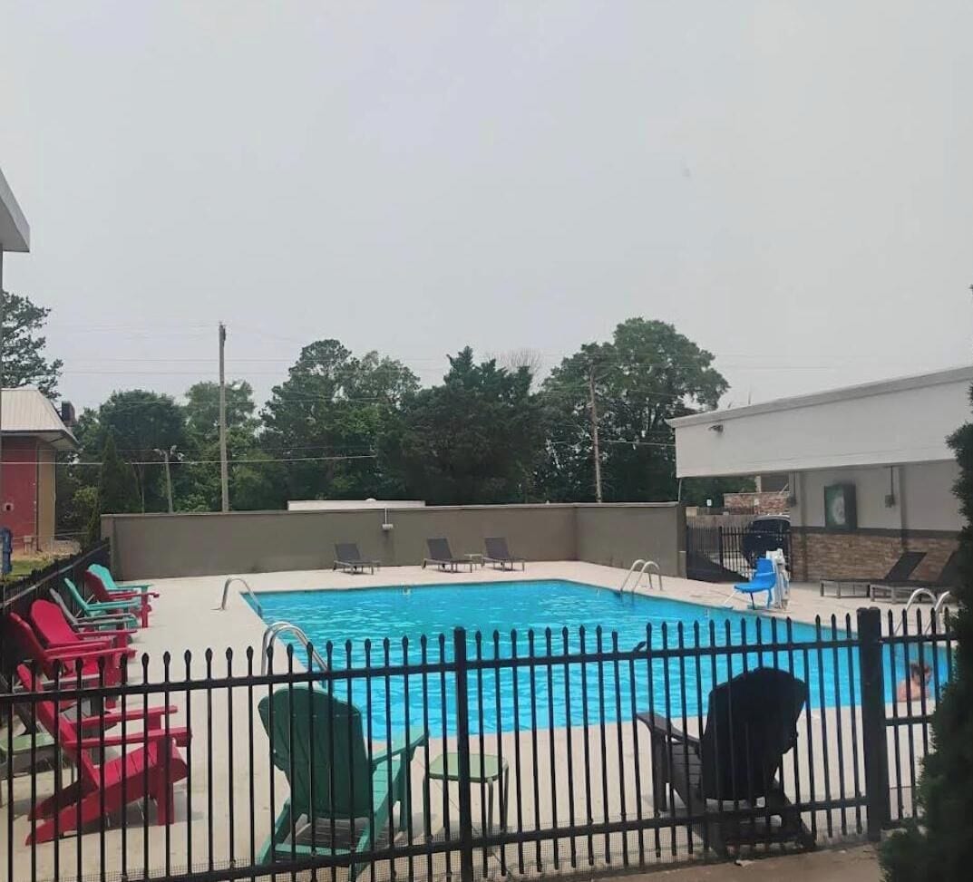Seasonal outdoor pool, pool loungers