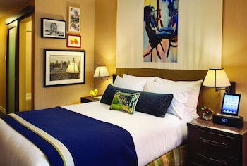 Hypo-allergenic bedding, in-room safe, desk, laptop workspace at Hotel Lincoln