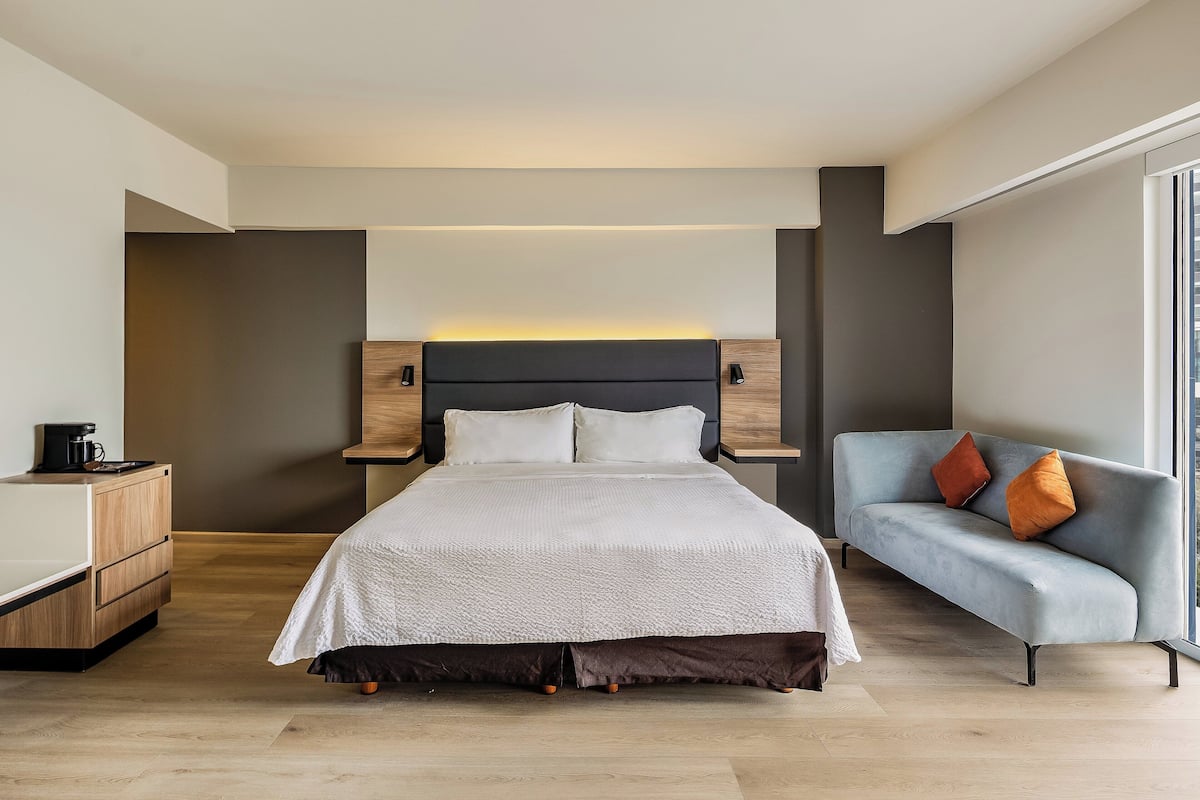 Junior Suite | In-room safe, desk, laptop workspace, iron/ironing board