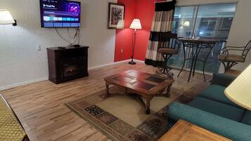 Suite, 1 King Bed, Non Smoking, Fireplace | Desk, laptop workspace, blackout drapes, soundproofing