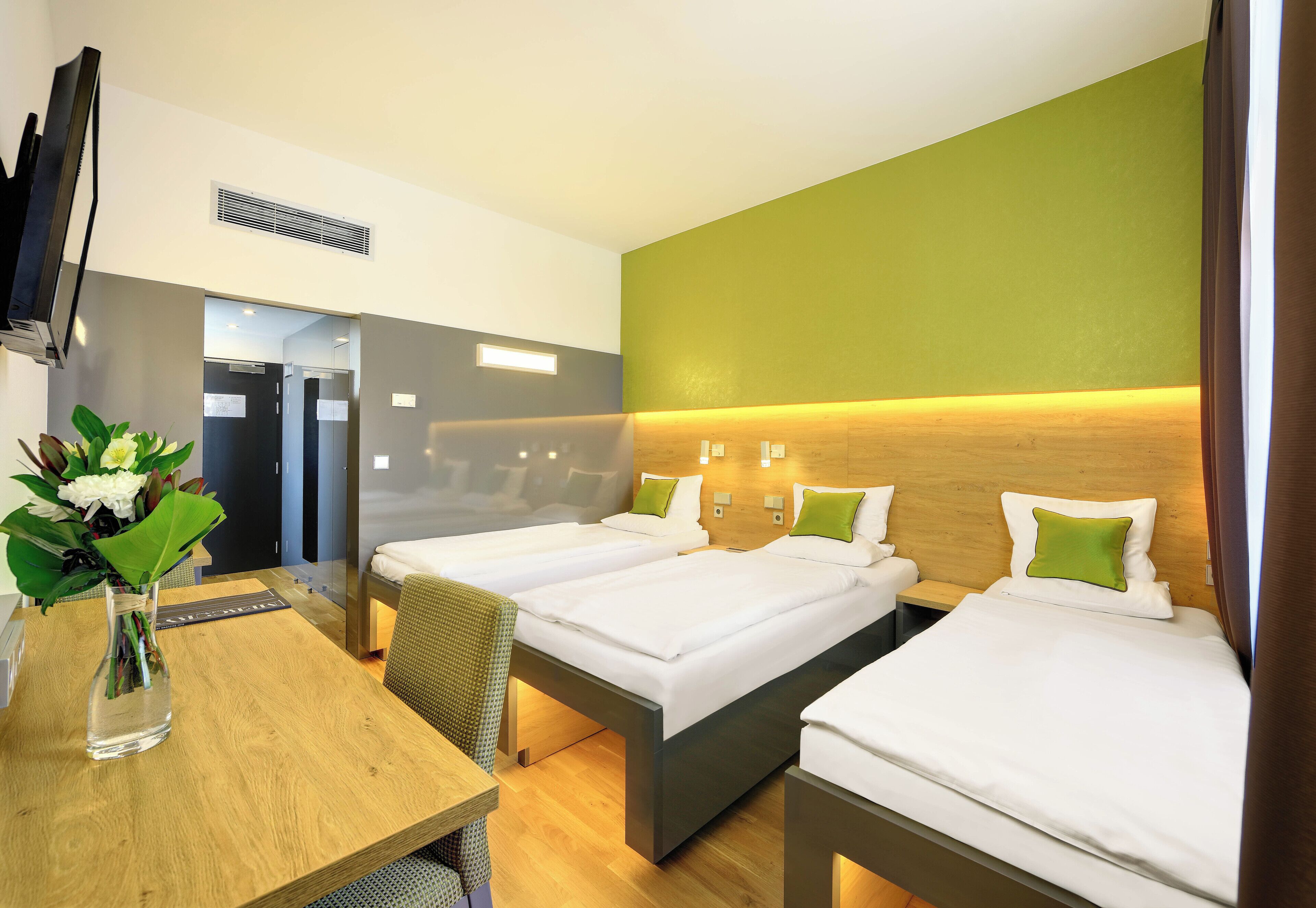 deluxe triple room | hypo-allergenic bedding, in-room safe, desk, laptop workspace