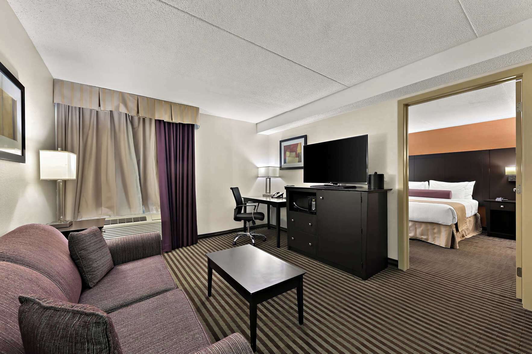 Hypo-allergenic bedding, pillow-top beds, desk, laptop workspace