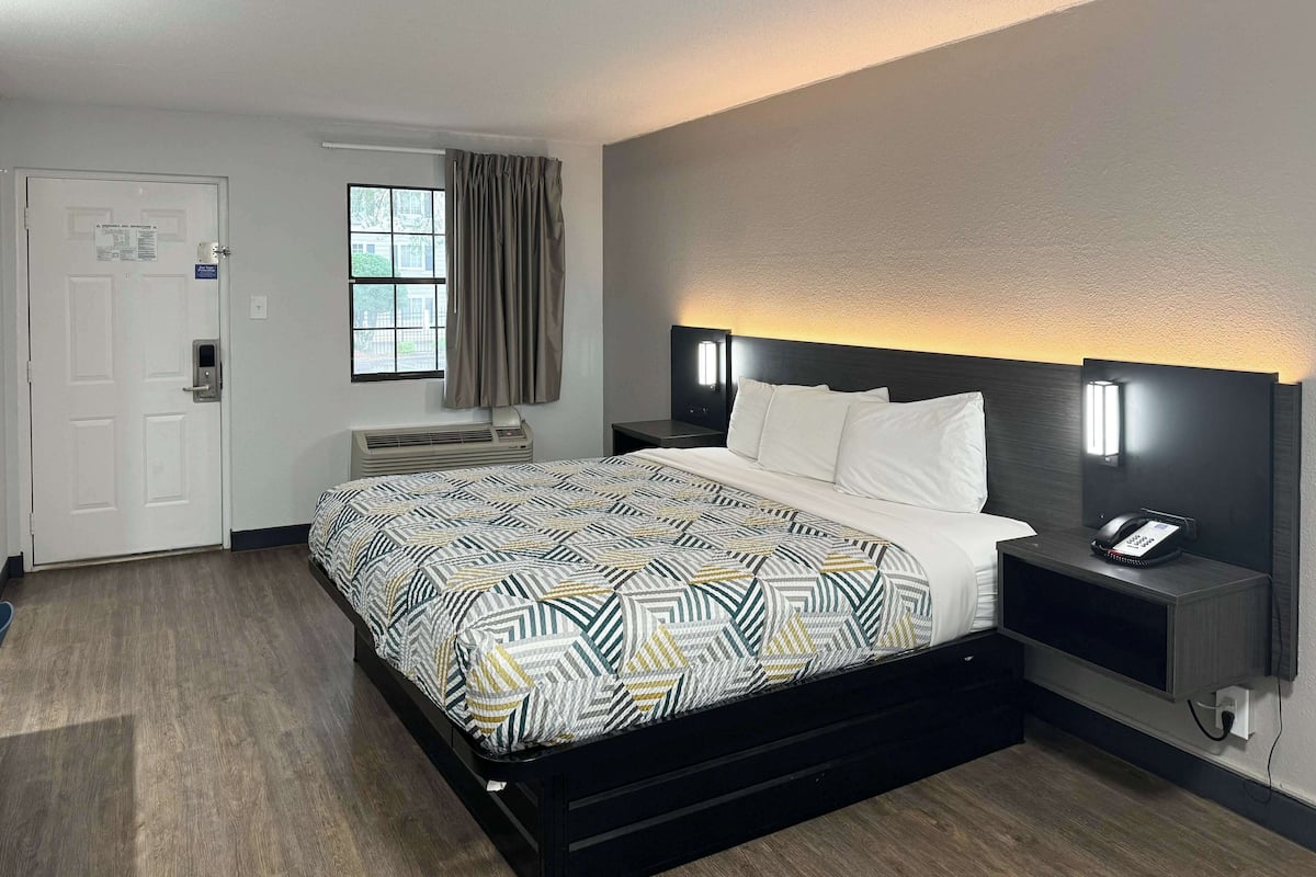 Premium bedding, desk, blackout curtains, iron/ironing board