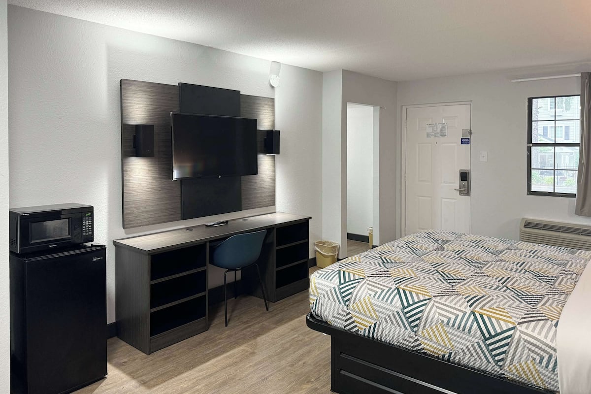 Premium bedding, desk, blackout curtains, iron/ironing board