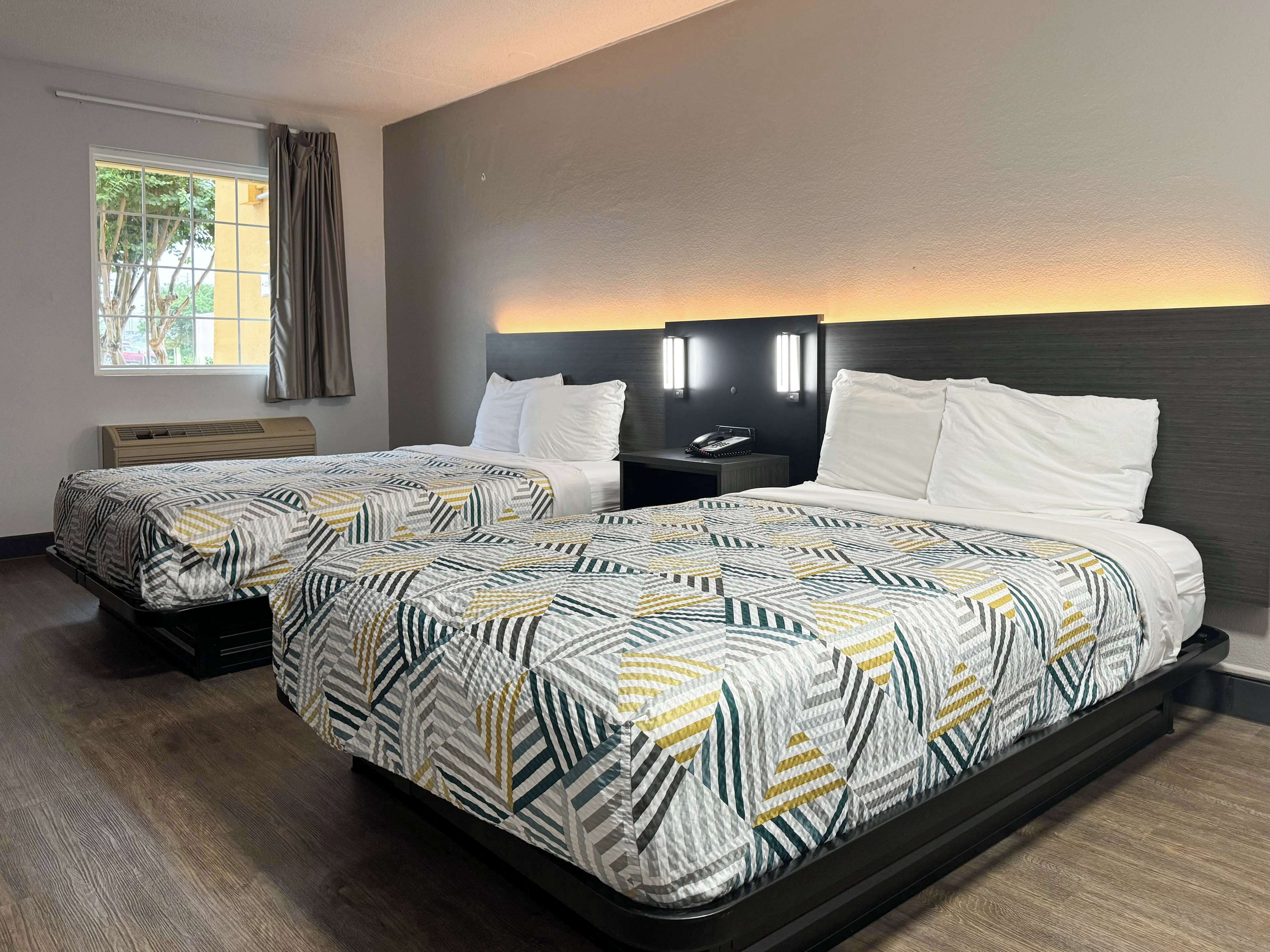 Premium bedding, desk, blackout drapes, iron/ironing board