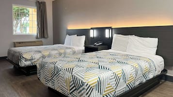 Premium bedding, desk, blackout drapes, iron/ironing board