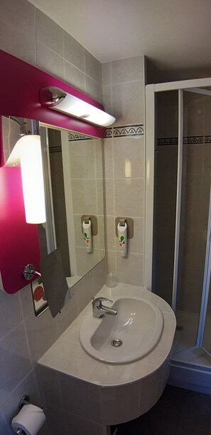 Shower, eco-friendly toiletries, hair dryer, towels