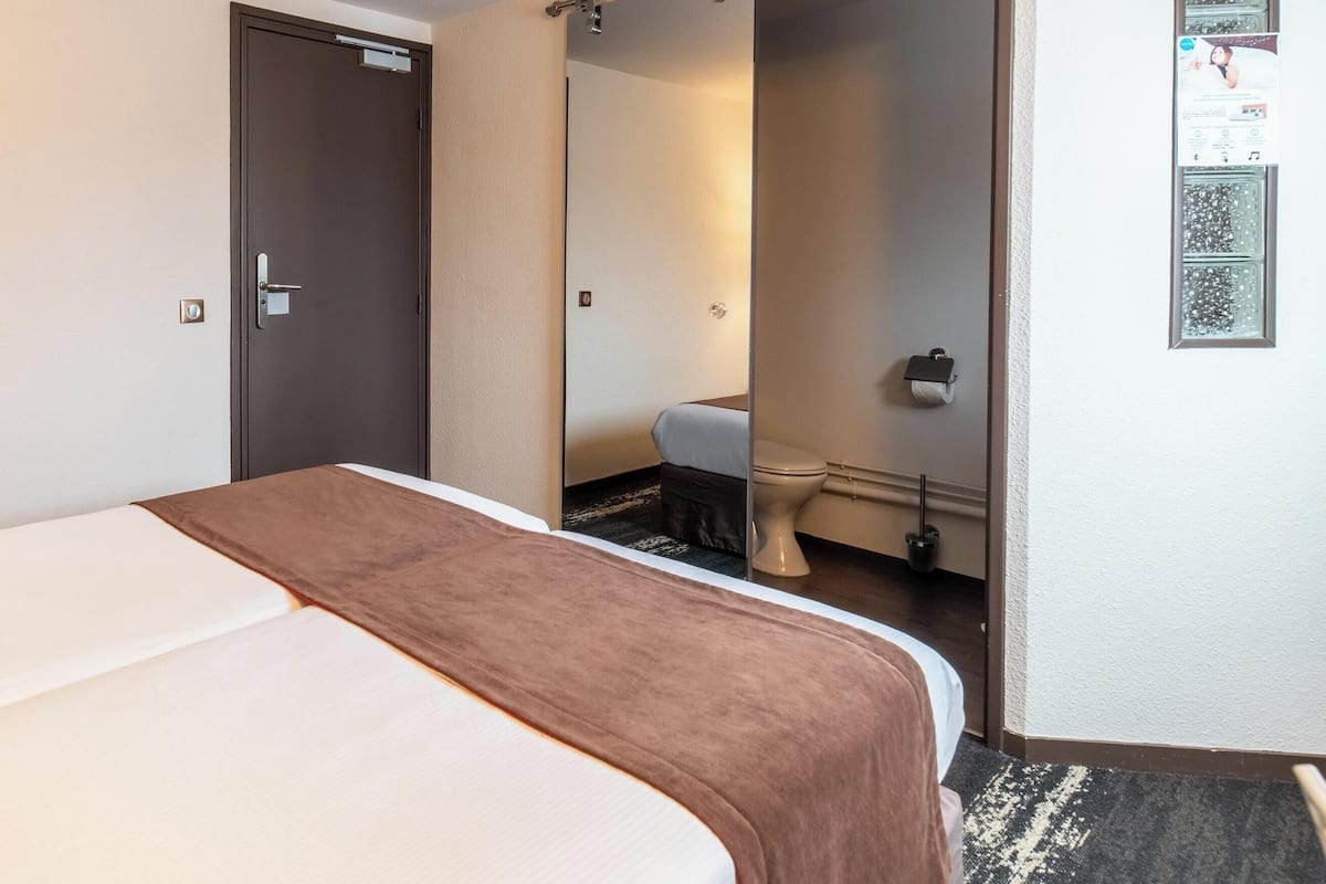 Habitación estándar, 2 camas individuales | Ropa de cama de alta calidad y decoración personalizada